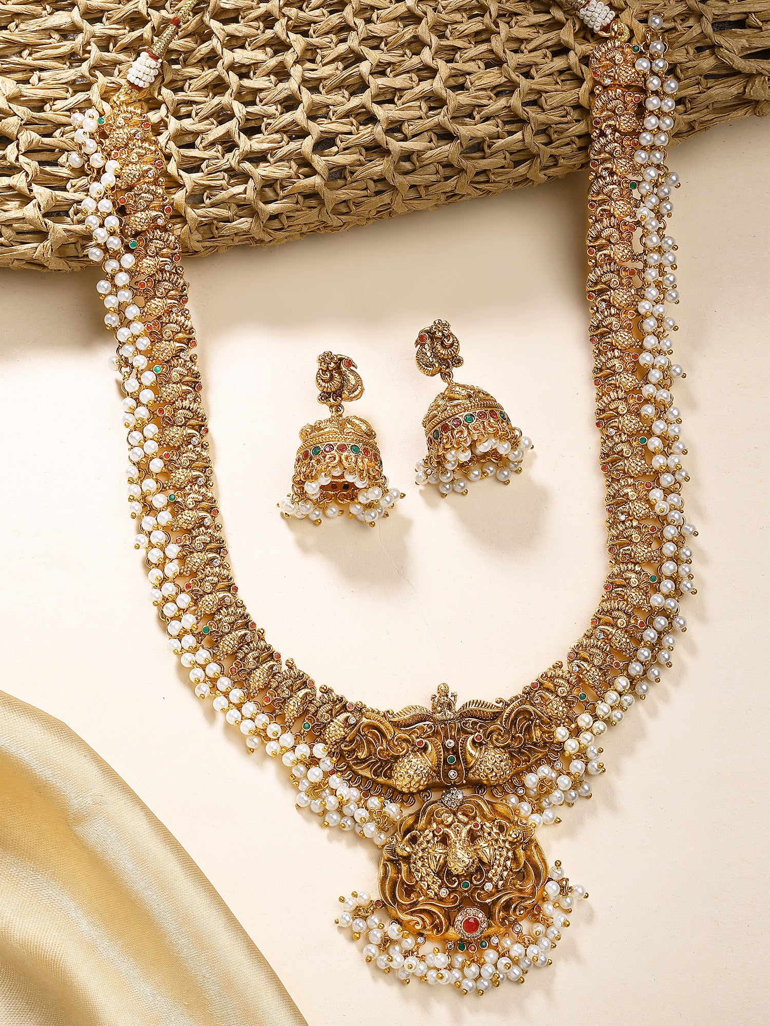 KARATCART Gold-Plated Pearl-Embellished Goddess Laxmi Temple Jewellery Set for Women