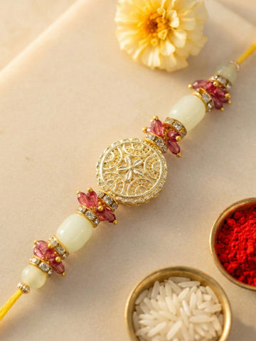 KARATCART Gold Plated Sea Green Beads and Pink Crystal Kundan Bhaiya Rakhi with Roli & Chawal