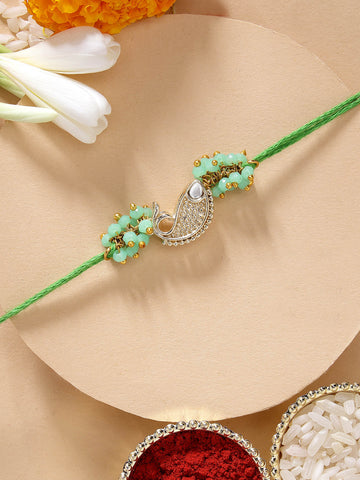 KARATCART Beautiful Light Green Fish Shape Handmade Kundan Rakhi for Brother with Roli & Chawal