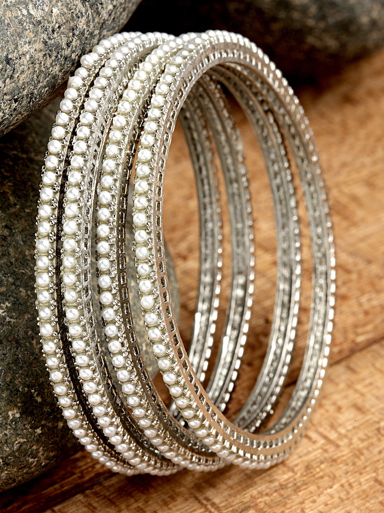 Karatcart Oxidised Silver Pearl Studded Tribal Set of 4 Bangles for Women