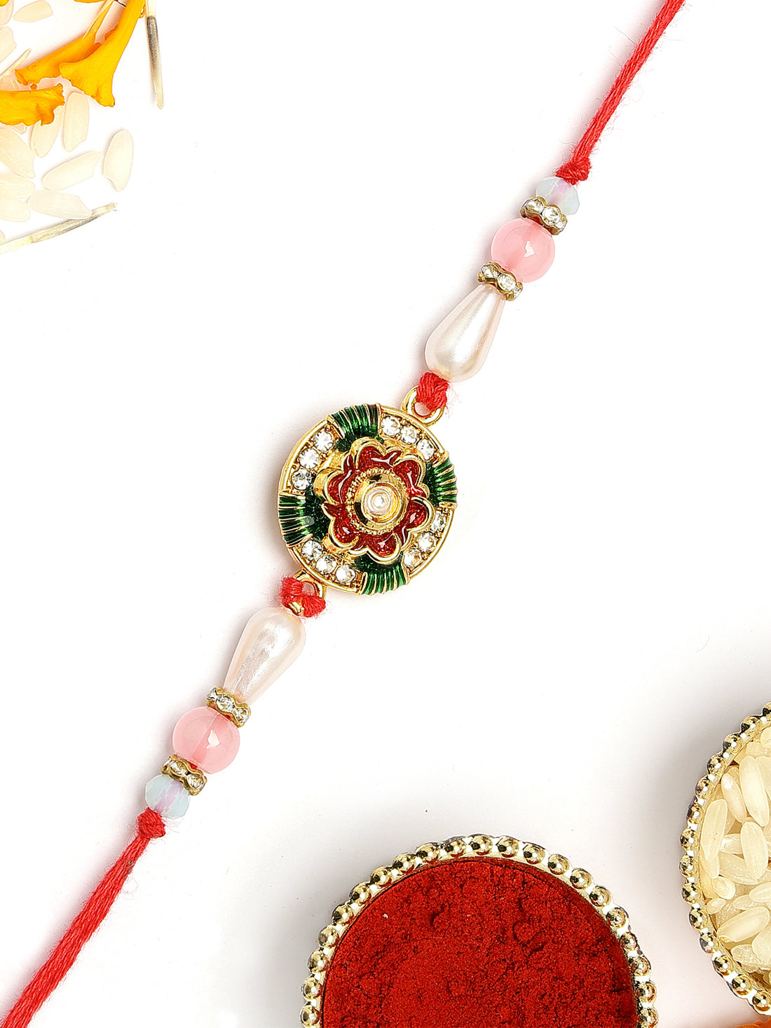 KARATCART Stylish Floral Design Red and Green Meena Handmade Rakhi for Brother with Roli Chawal