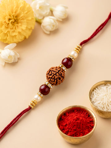 KARATCART Gold Plated Rudraksha Studded Designer Bhaiya Rakhi with Roli & Chawal