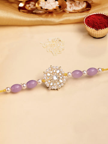 KARATCART Gold Plated Purple Beads Floral Kundan Bhaiya Rakhi with Roli & Chawal