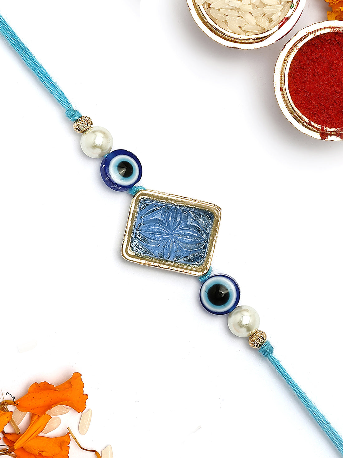 KARATCART Gold Plated Blue Carved Stone Evil Eye Kundan Bhaiya Rakhi with Roli & Chawal