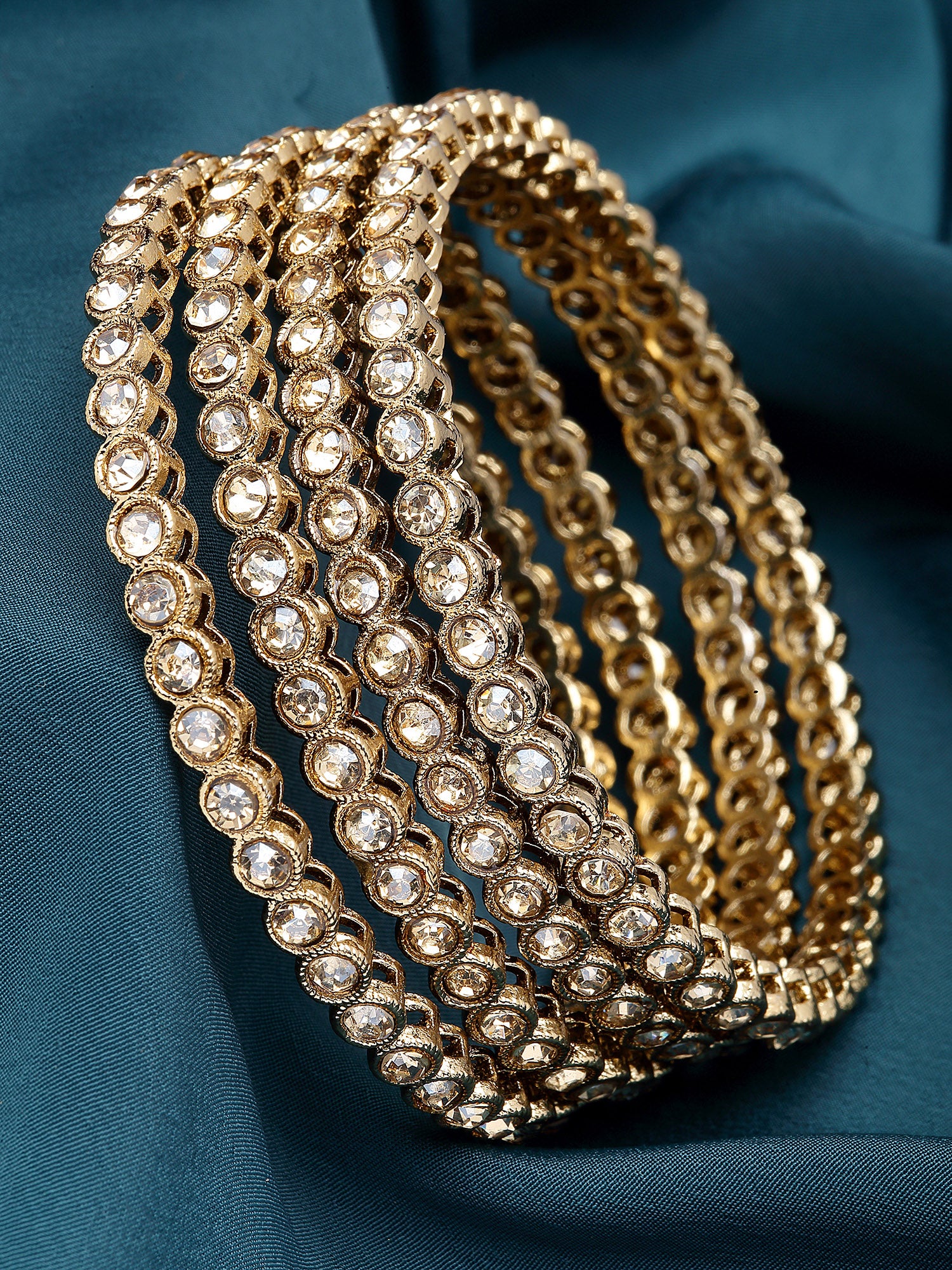 Karatcart Set of 4 Gold Plated Round Shape Golden Kundan Studded Bangles for Women