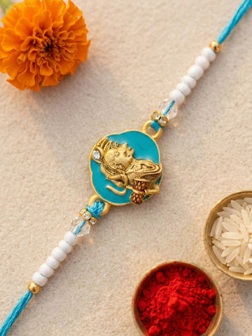 KARATCART Gold Plated Blue Shiv Parvati Designer Bhaiya Rakhi with Roli & Chawal