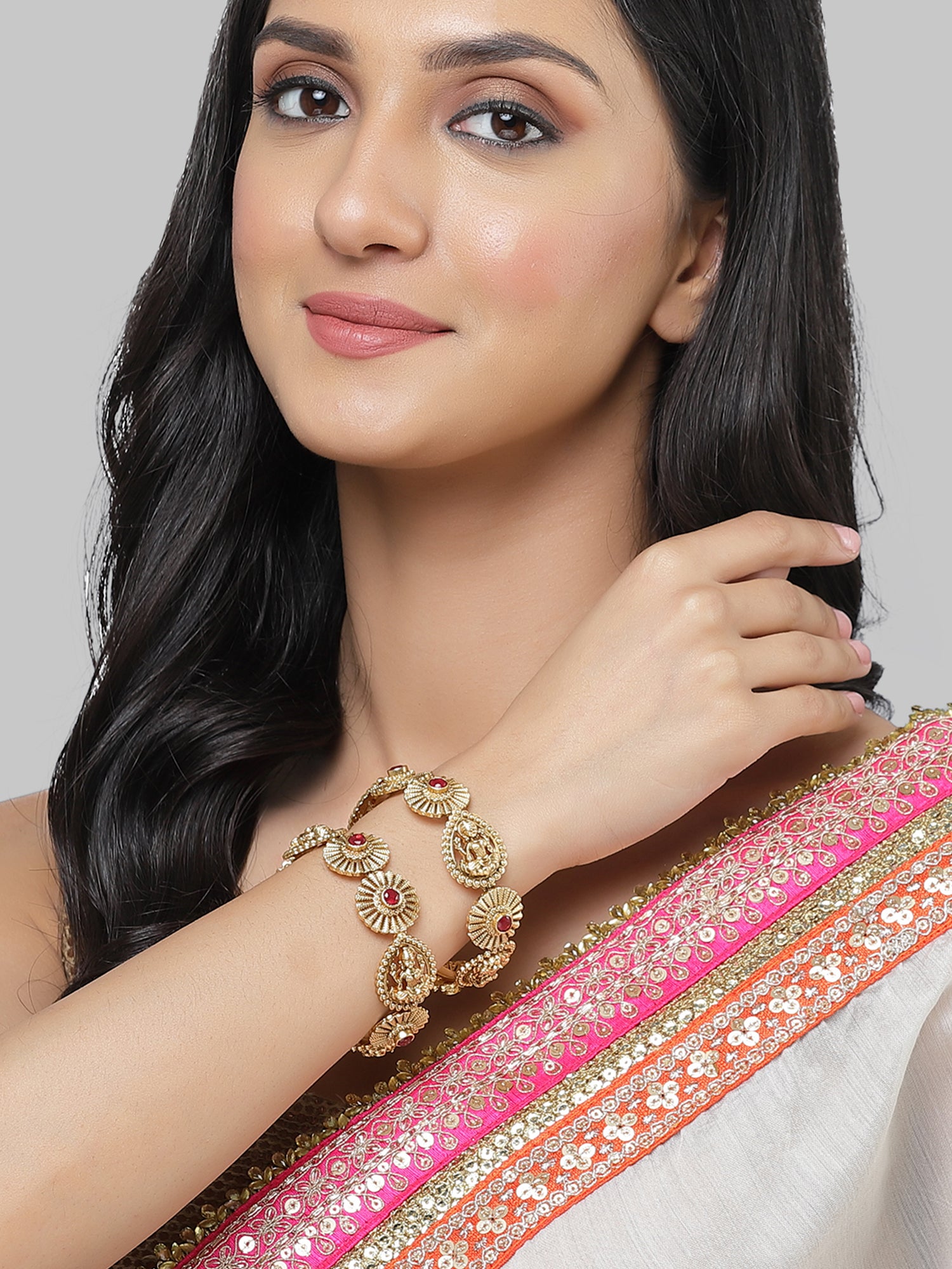 Karatcart Set of 2 Gold Plated Laxmi Mata Design Red Stone Bangles for Women - Image 1