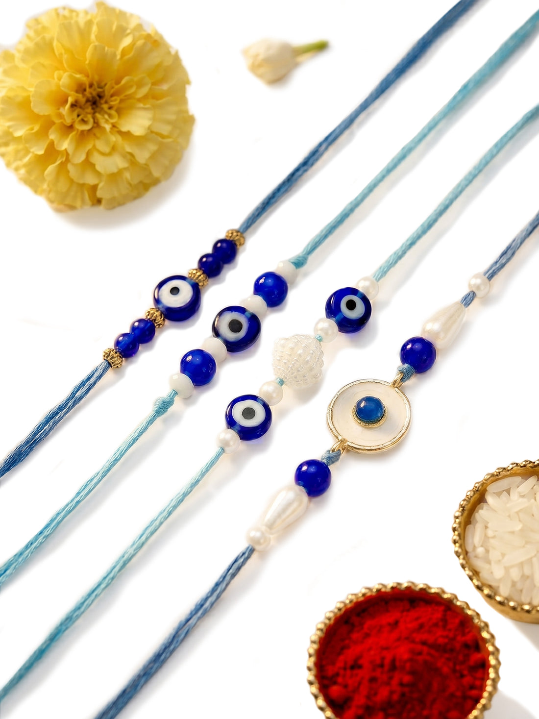 KARATCART Set of 4 Handmade Blue Beads Meenakari Evil Eye Kundan Rakhis for Brother with Roli and Chawal