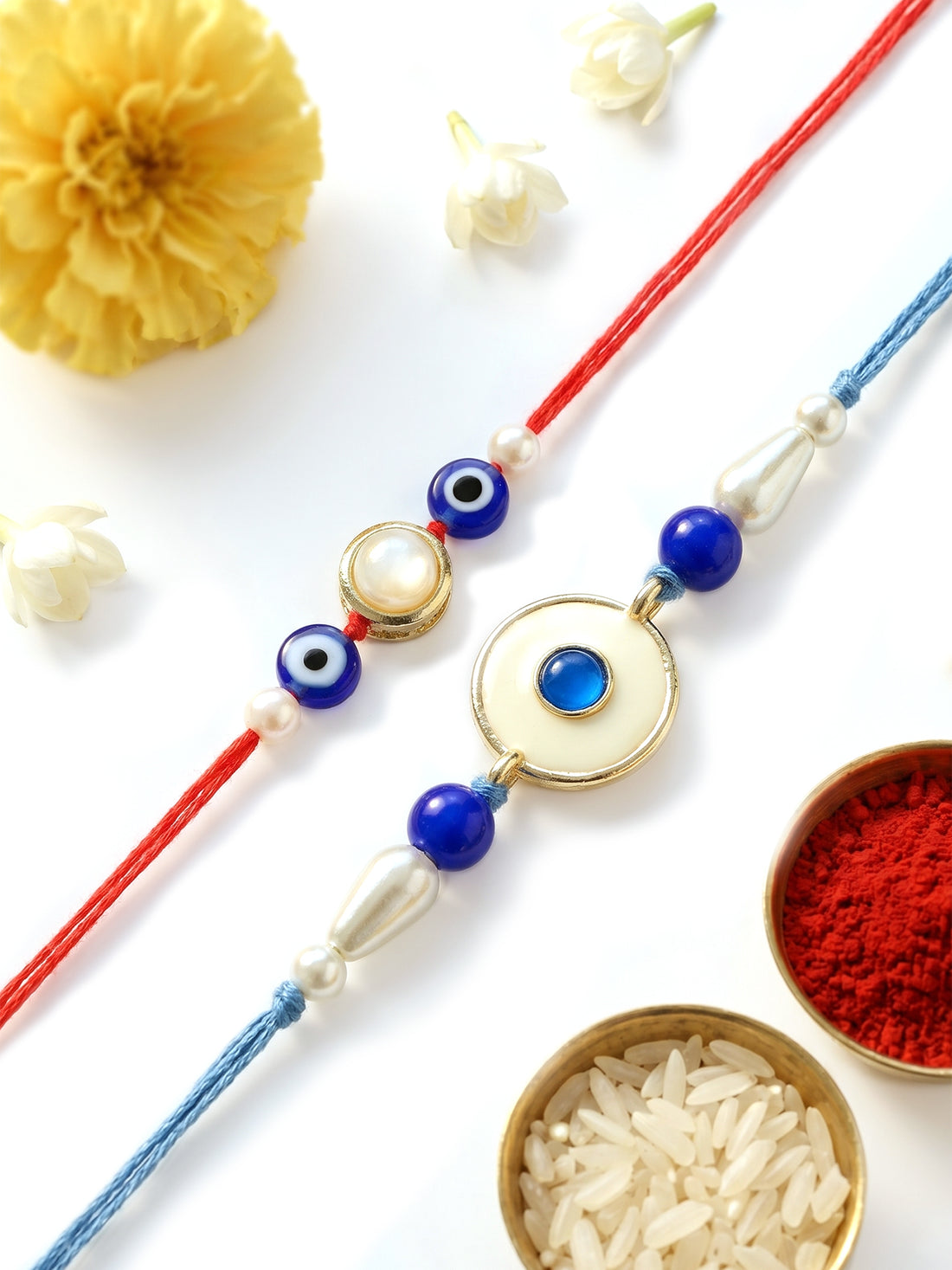 KARATCART Set of 2 Blue Evil Eye and Pearl Handmade Kundan Rakhi for Brother with Roli & Chawal