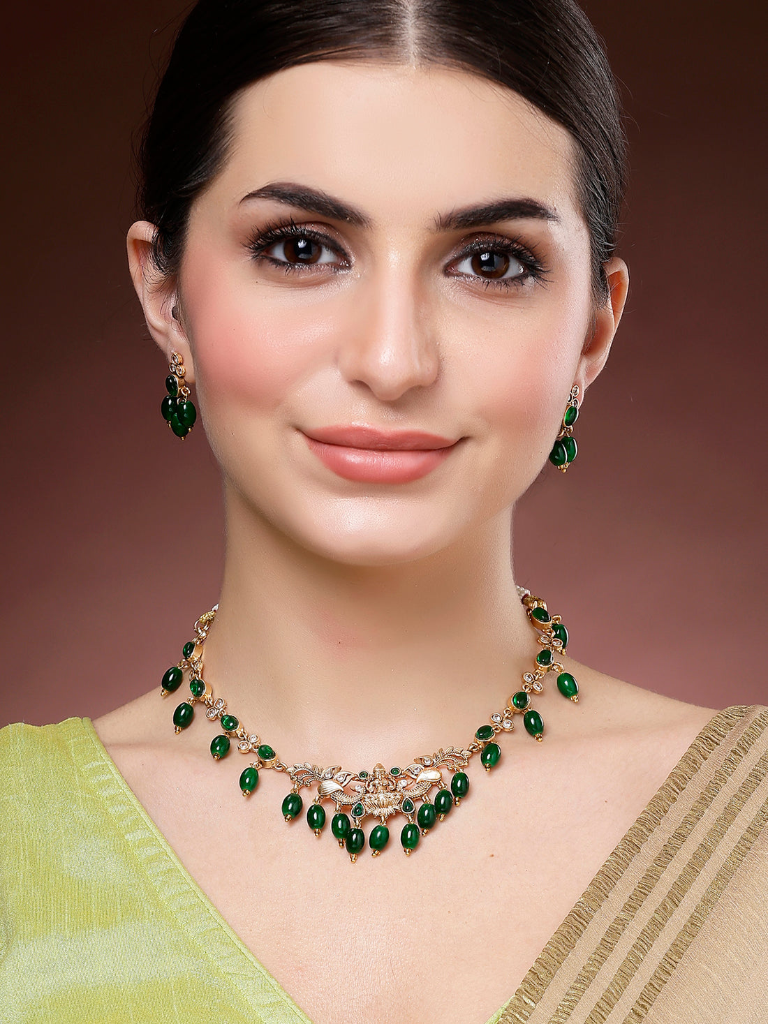 Karatcart Green Tumble Stone Gold Plated Laxmi Mata Temple Jewellery Set for Women