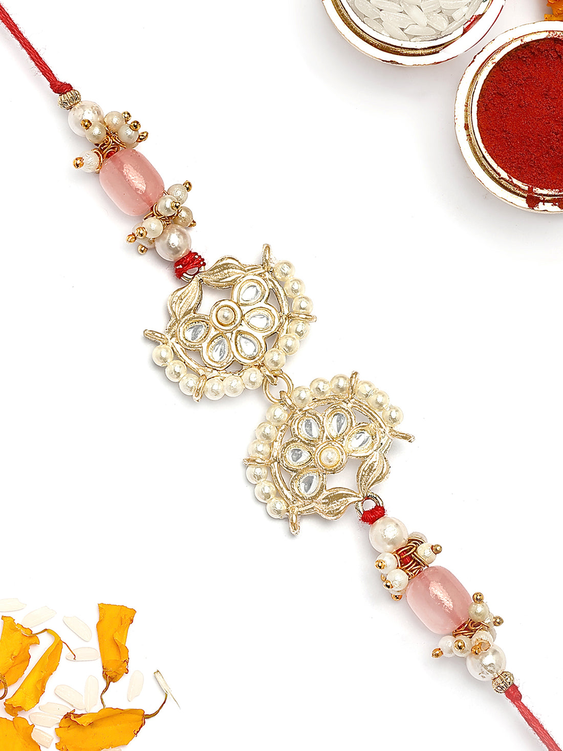 KARATCART Gold Plated Pink Tumble Kundan Bhaiya Rakhi with Roli & Chawal