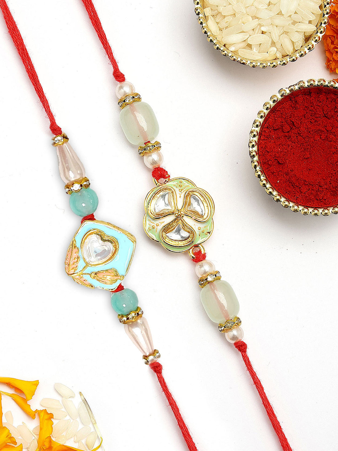 KARATCART Set of 2 Pink and Light Green Handmade Kundan Rakhi for Brother with Roli & Chawal