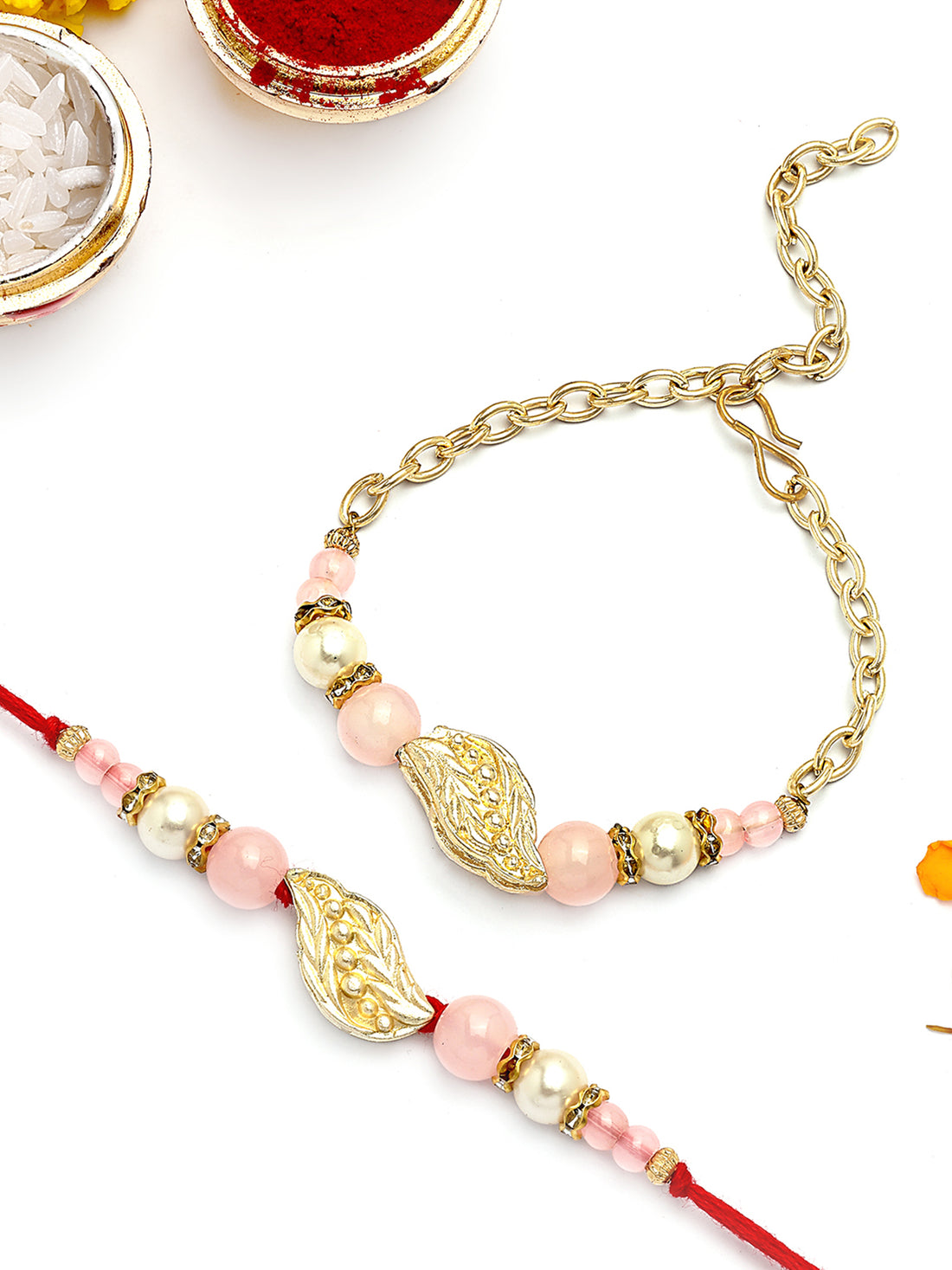 KARATCART Gold Plated Pink Beads Feather Kundan Bhaiya Bhabhi Rakhi with Roli & Chawal