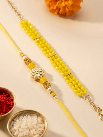 KARATCART Gold Plated Yellow Crystal Floral Bhaiya Bhabhi Rakhi with Roli & Chawal