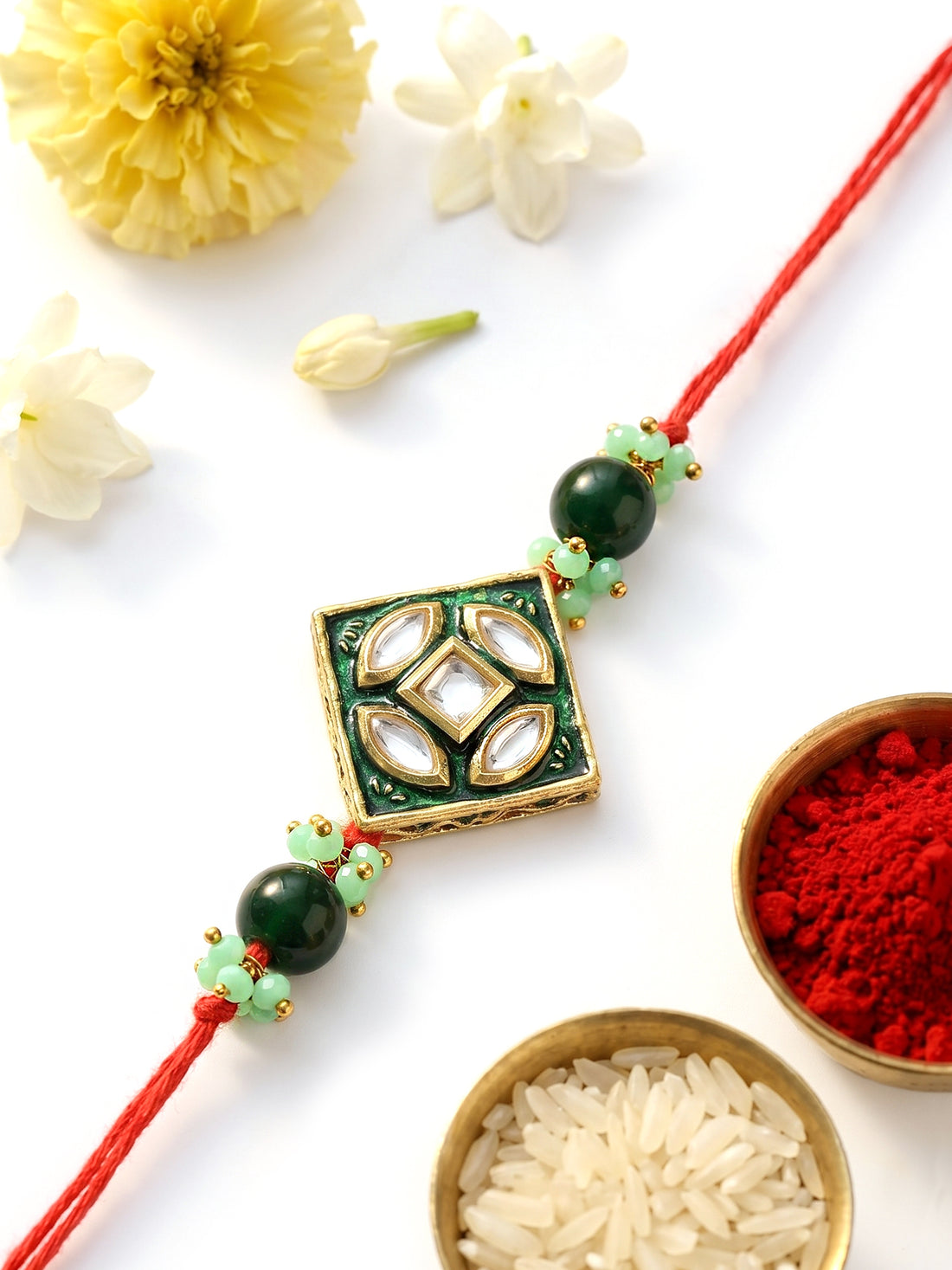 KARATCART Designer Green Meena Floral Design Handmade Kundan Rakhi for Brother with Roli & Chawal