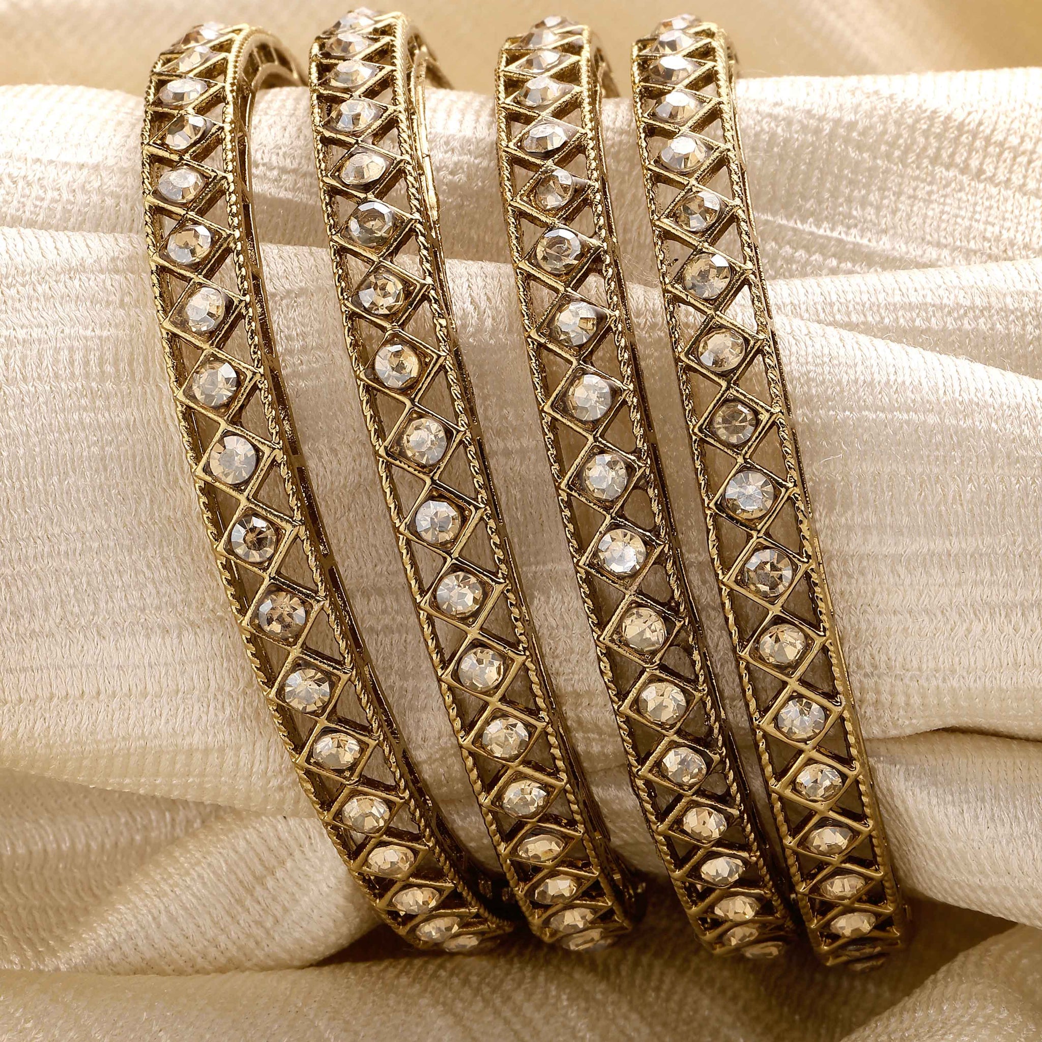 Karatcart Set of 4 Diamond Shape Kundan Studded Antique Gold Plated Bangles for Women