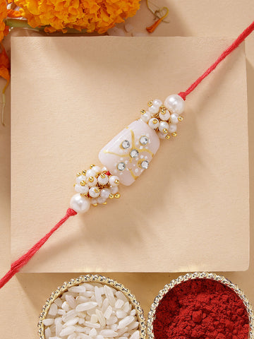 KARATCART Elegant Light Weight White Tumble Rakhi for Brother with Roli Chawal