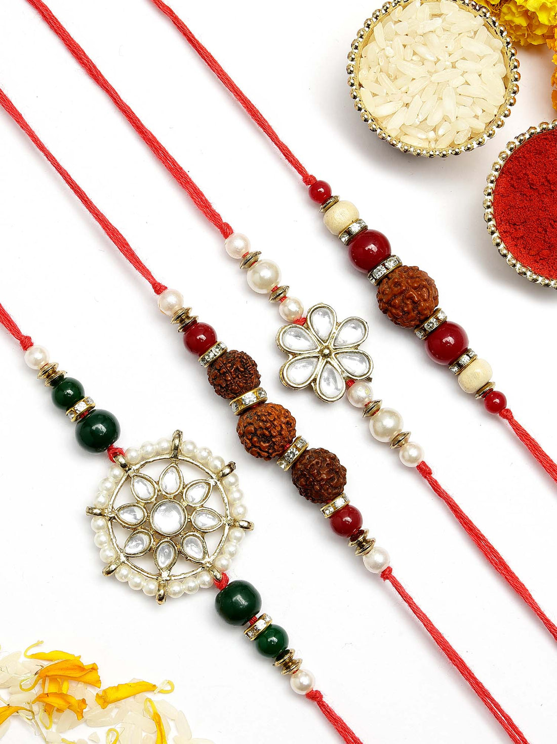 KARATCART Set of 4 Gold-Plated Kundan Rakhi with Roli Chawal for Brother