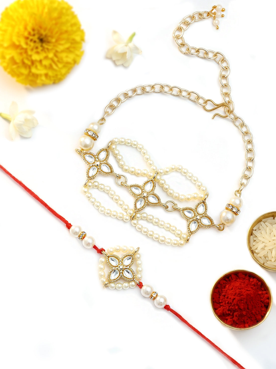 KARATCART Gold Plated Diamond Floral Design Handmade Kundan Bhaiya Bhabhi Rakhi with Roli & Chawal