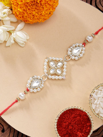 KARATCART Traditional Gold Plated Floral Design Handmade Kundan Rakhi for Brother with Roli Chawal