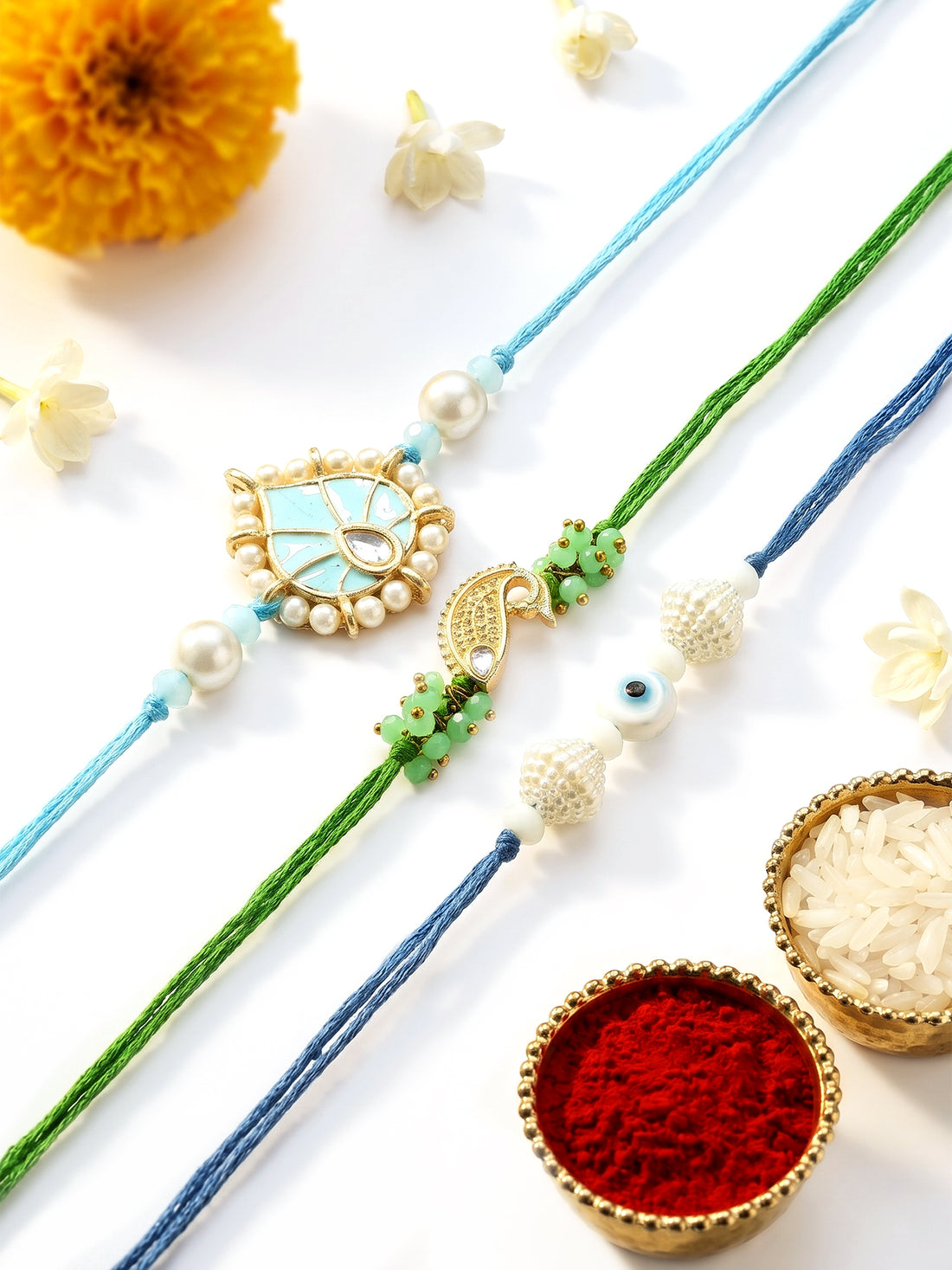 KARATCART Set of 3 Handmade Fish and Evil Eye Kundan Rakhis for Brother with Roli & Chawal