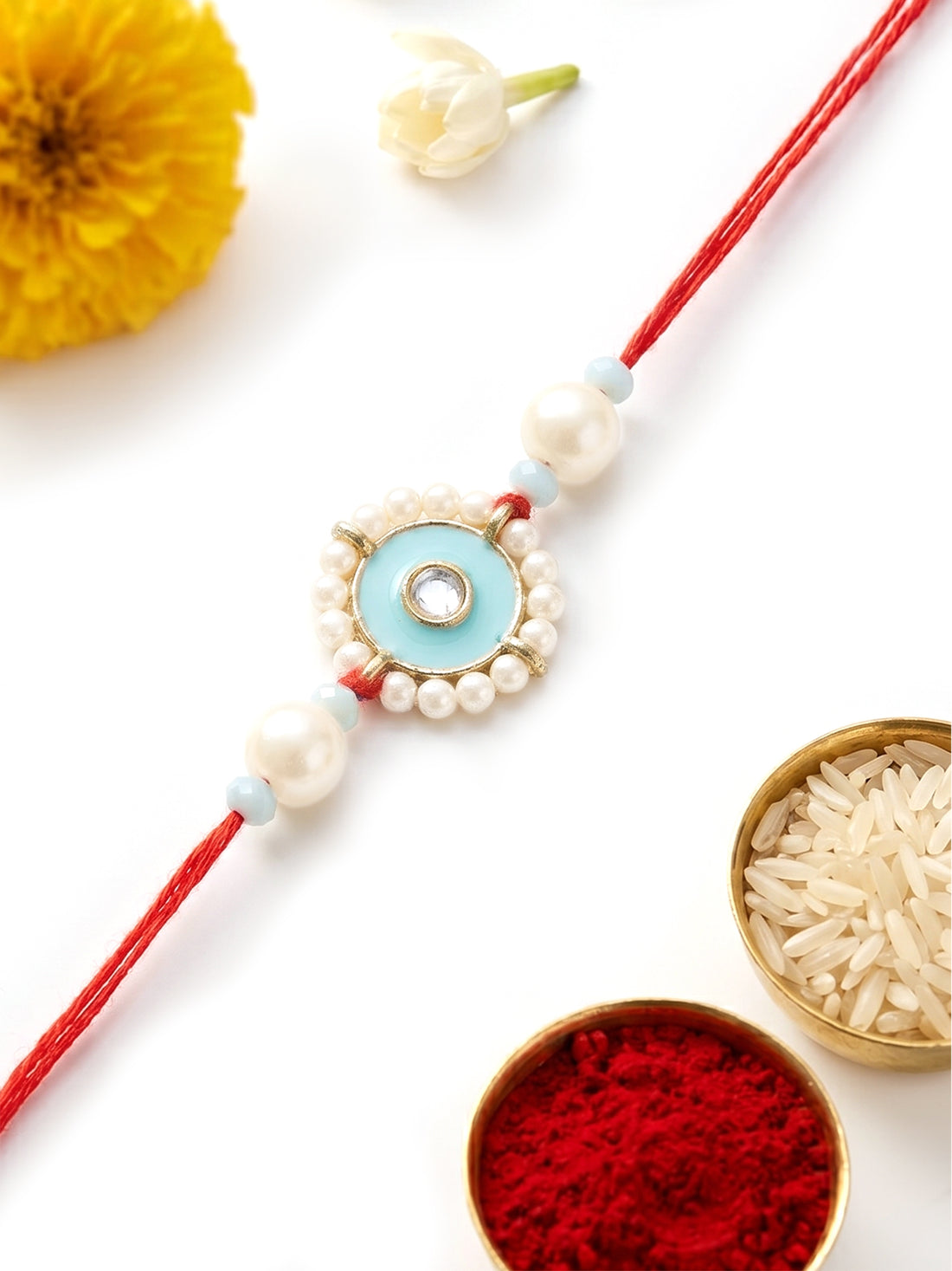 KARATCART Light Blue Meena Evil Eye Design Handmade Kundan Rakhi for Brother with Roli & Chawal