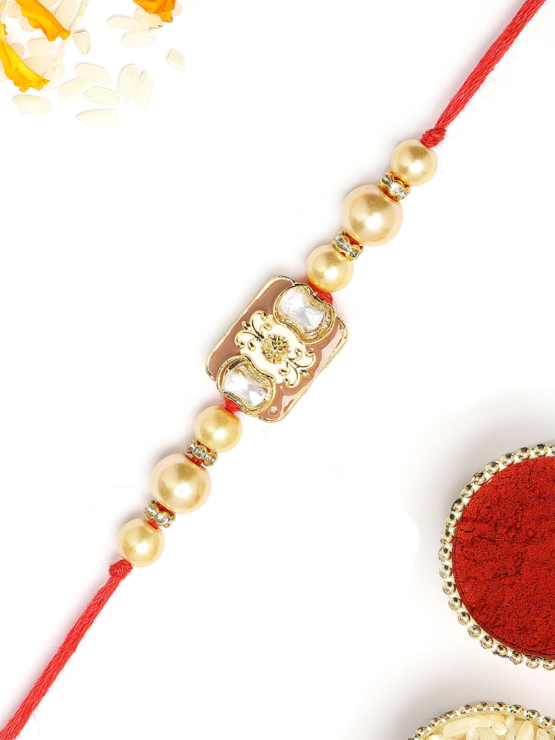 KARATCART Vibrant Brown Meena Golden Pearl Handmade Kundan Rakhi for Brother with Roli & Chawal