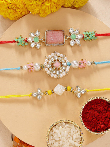 KARATCART Set of 3 Handmade Pink Carved Stone Kundan Rakhis for Brother with Roli & Chawal