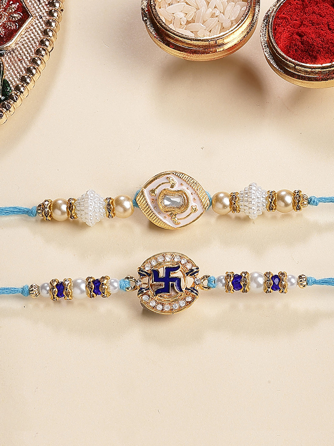 Karatcart Set of 2 White and Blue Swastik Design Enamel Kundan Rakhi for Brother with Roli & Chawal