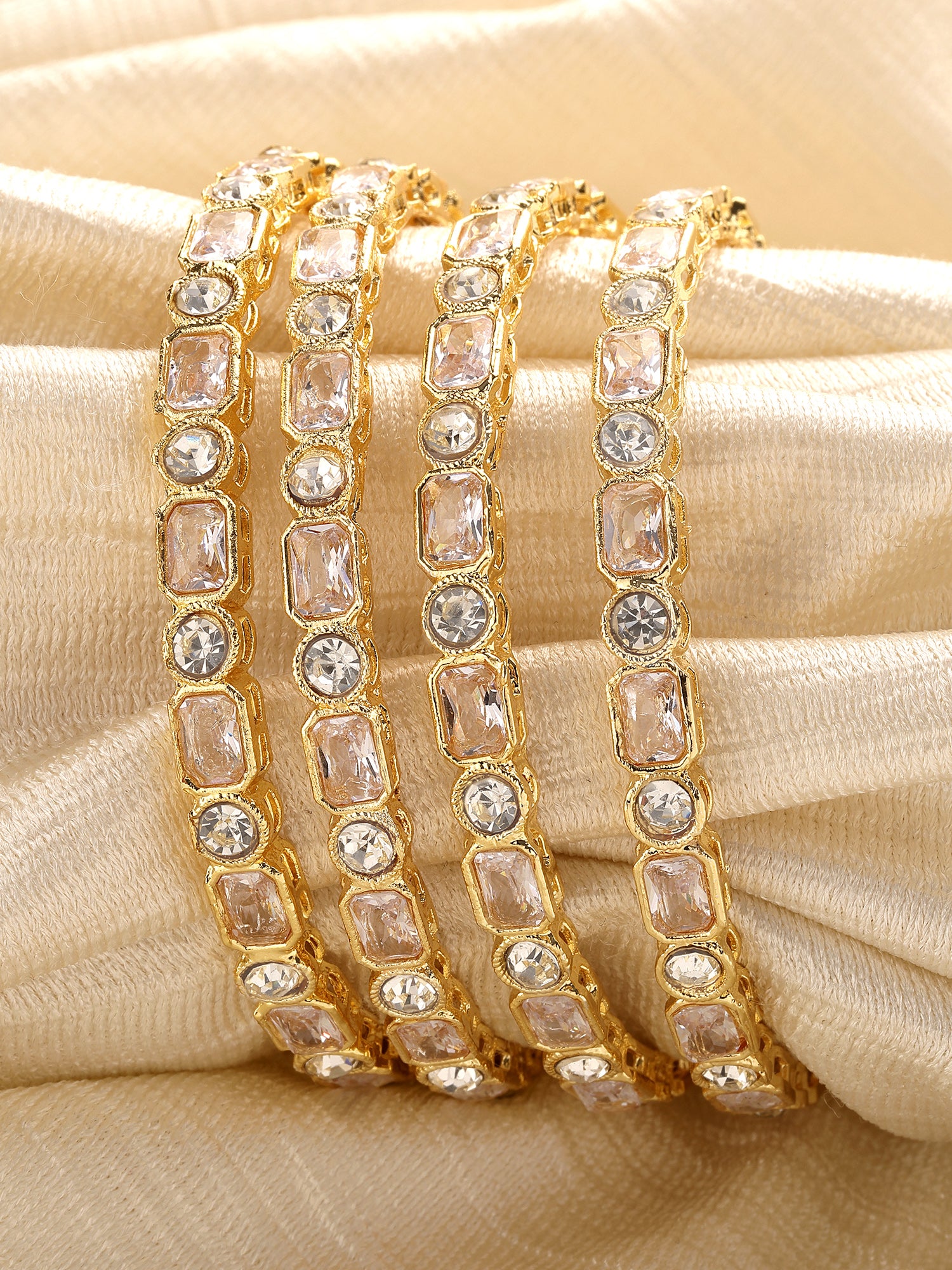 Karatcart Set of 4 American Diamond Studded Gold Plated Bangles for Women