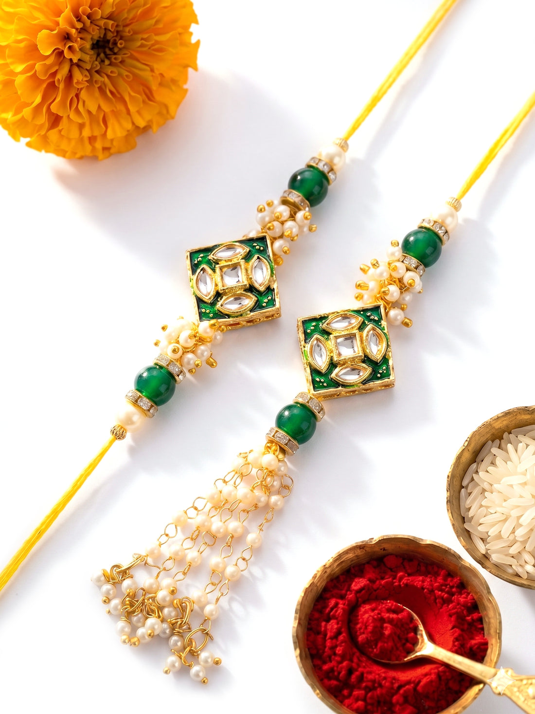 KARATCART Gold Plated Green Meena Kundan Bhaiya Bhabhi Rakhi with Roli & Chawal