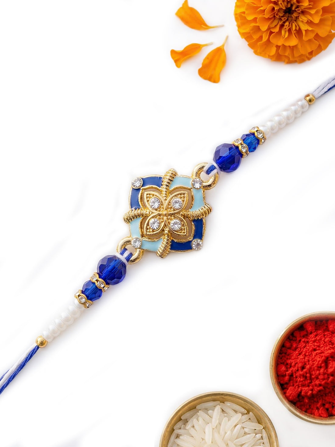 KARATCART Gold Plated Royal Blue Meenakari Flower Designer Bhaiya Rakhi with Roli & Chawal