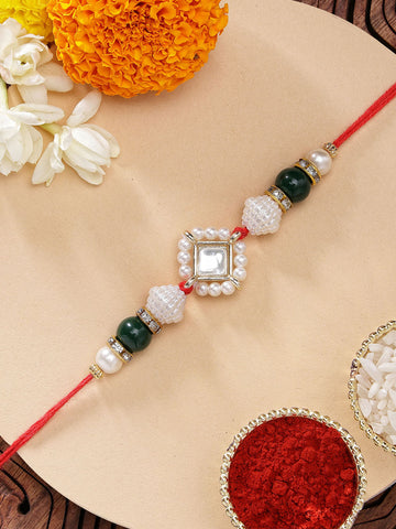 KARATCART Classic Gold Plated Green Beads Handmade Kundan Rakhi for Brother with Roli & Chawal