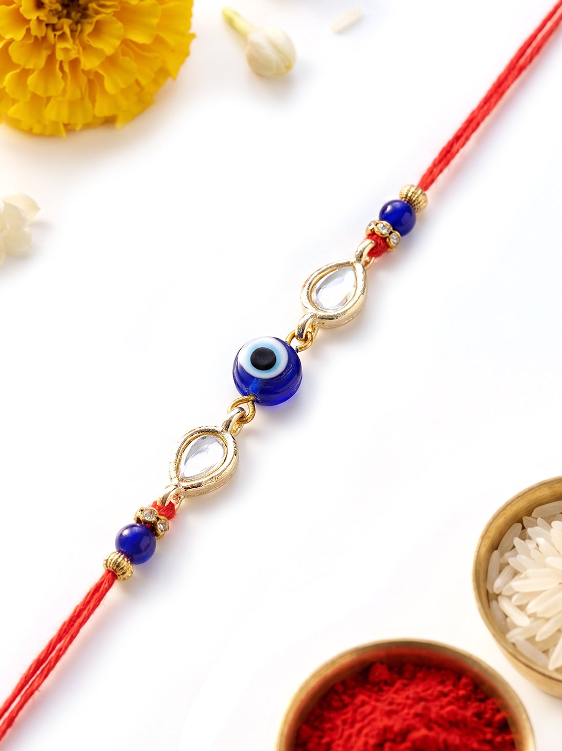 KARATCART Beautiful Evil Eye and Kundan Handmade Rakhi for Brother with Roli Chawal