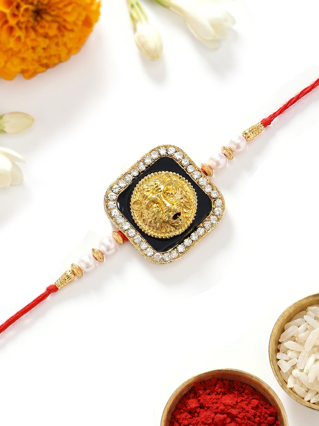KARATCART Beautiful Handmade Meenakari Lion Shape Rakhi for Brother with Roli Chawal