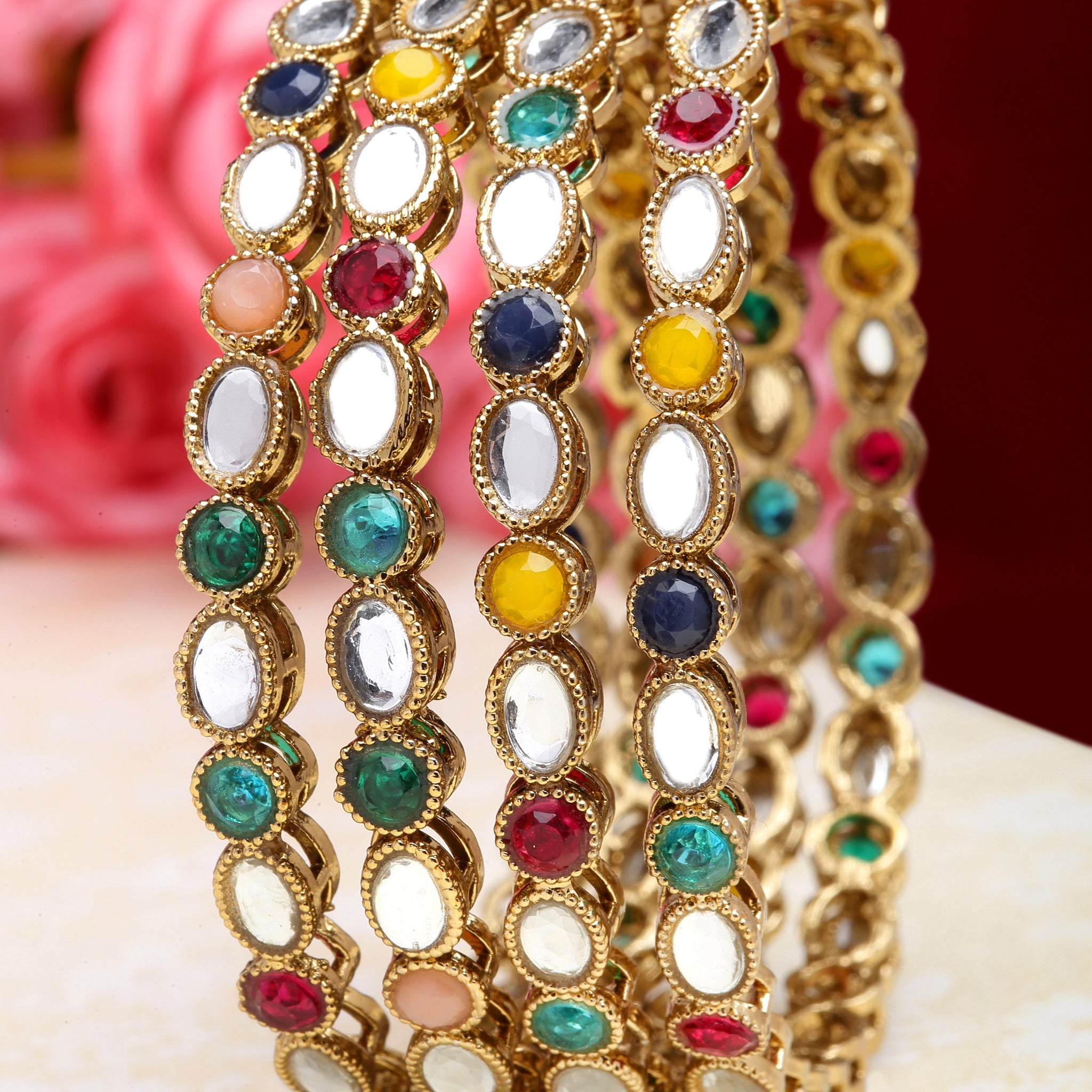 Karatcart Gold Plated Set of 4 Oval Shape Multicolor Stone Studded Bangles for Women