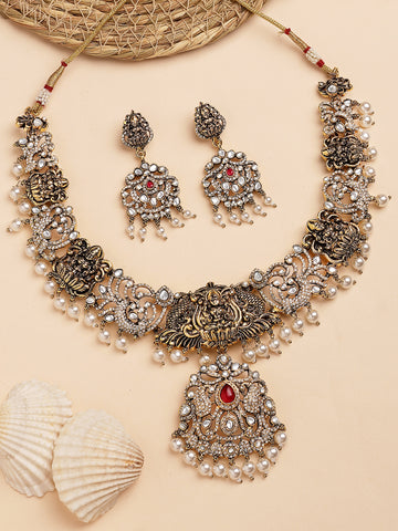 KARATCART Black Gold Plated Red Stone Laxmi Mata Temple Jewellery Set for Women