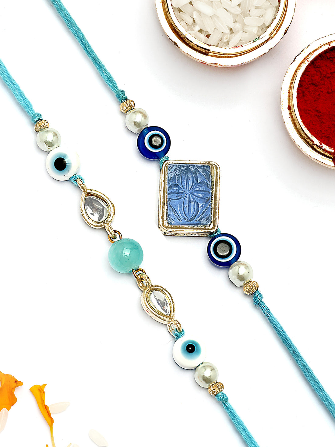 KARATCART Set of 2 Blue Carved Stone Evil Eye Kundan Rakhi for Brother with Roli & Chawal