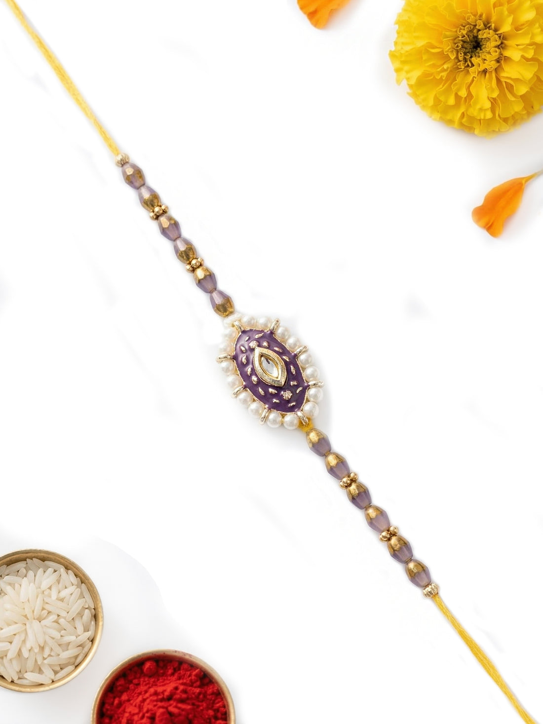 KARATCART Gold Plated Purple Meena Oval Kundan Bhaiya Rakhi with Roli & Chawal