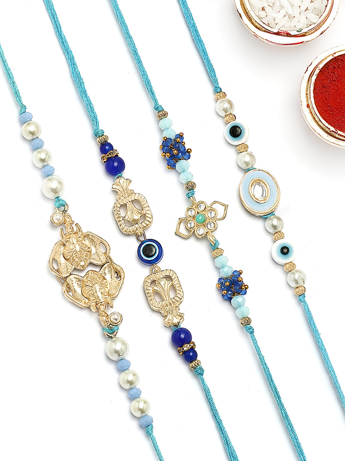 KARATCART Set of 4 Blue and White Kundan Rakhi for Brother with Roli & Chawal