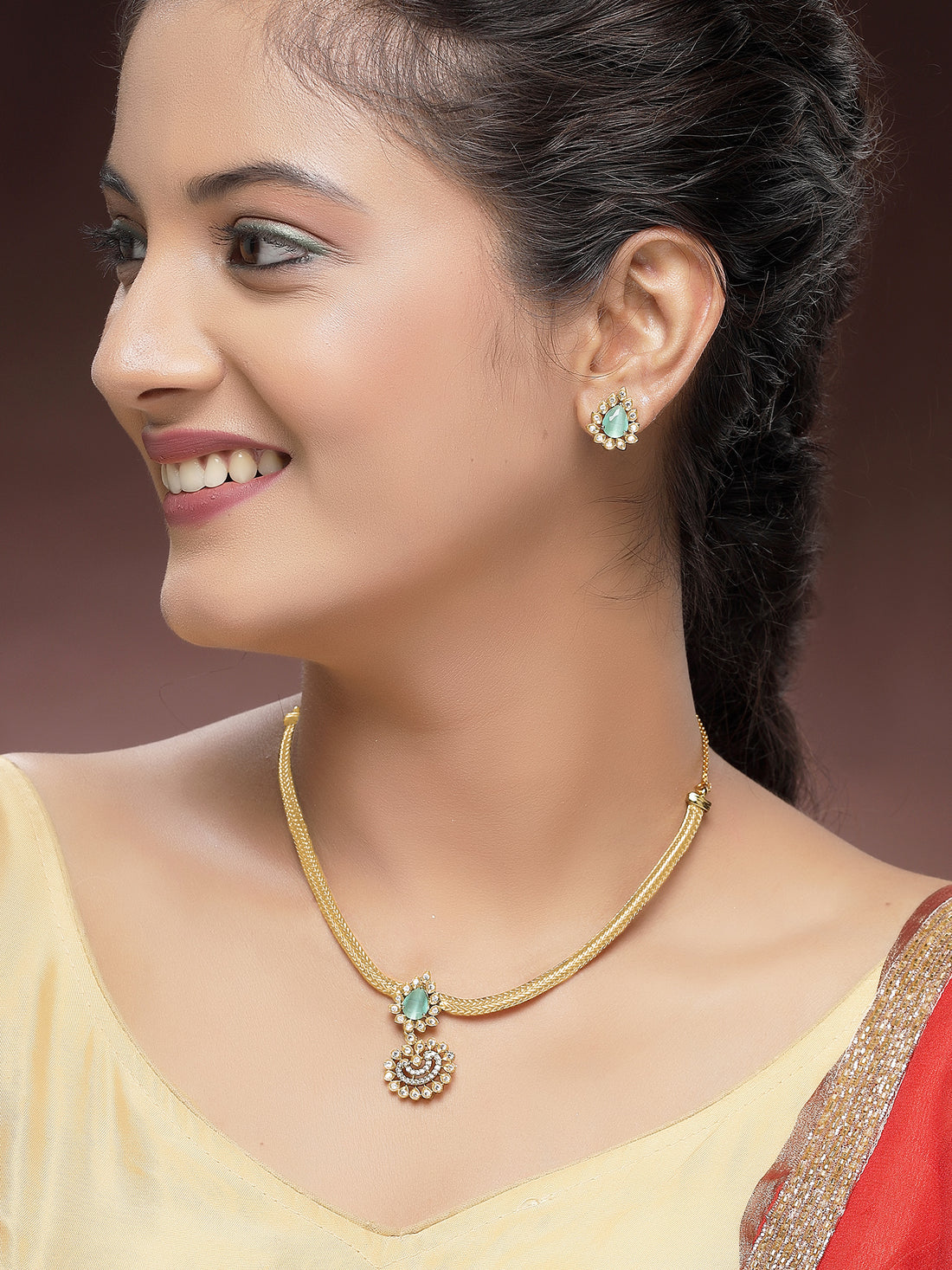 KARATCART Traditional Gold Plated Floral Lime Green Stone Temple Jewellery Set for Women