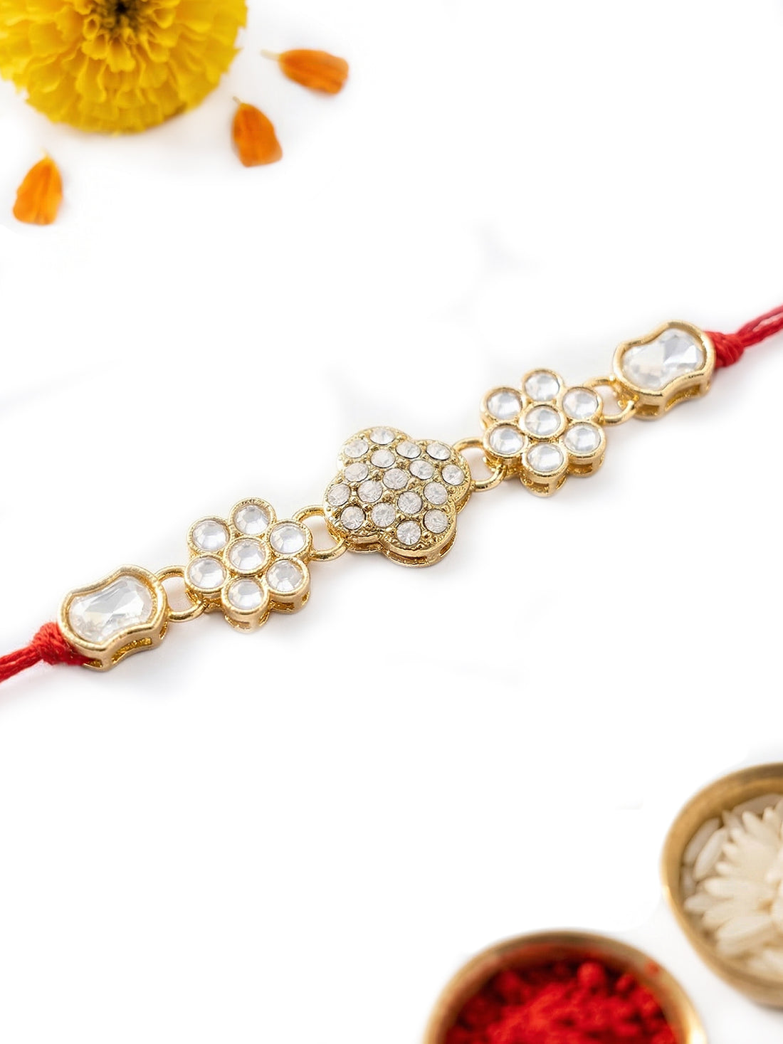 KARATCART Gold Plated White Stone Floral Kundan Bhaiya Rakhi with Roli & Chawal
