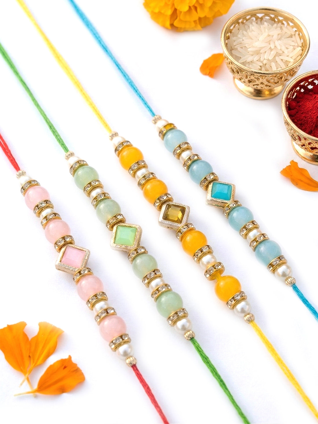 KARATCART Set of 4 Pastel Beaded Designer Kundan Rakhi for Brother with Roli & Chawal
