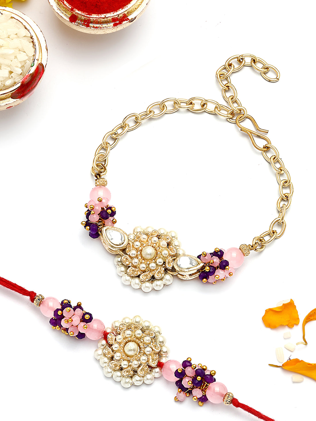 KARATCART Gold Plated Pink and Purple Crystal Kundan Bhaiya Bhabhi Rakhi with Roli & Chawal