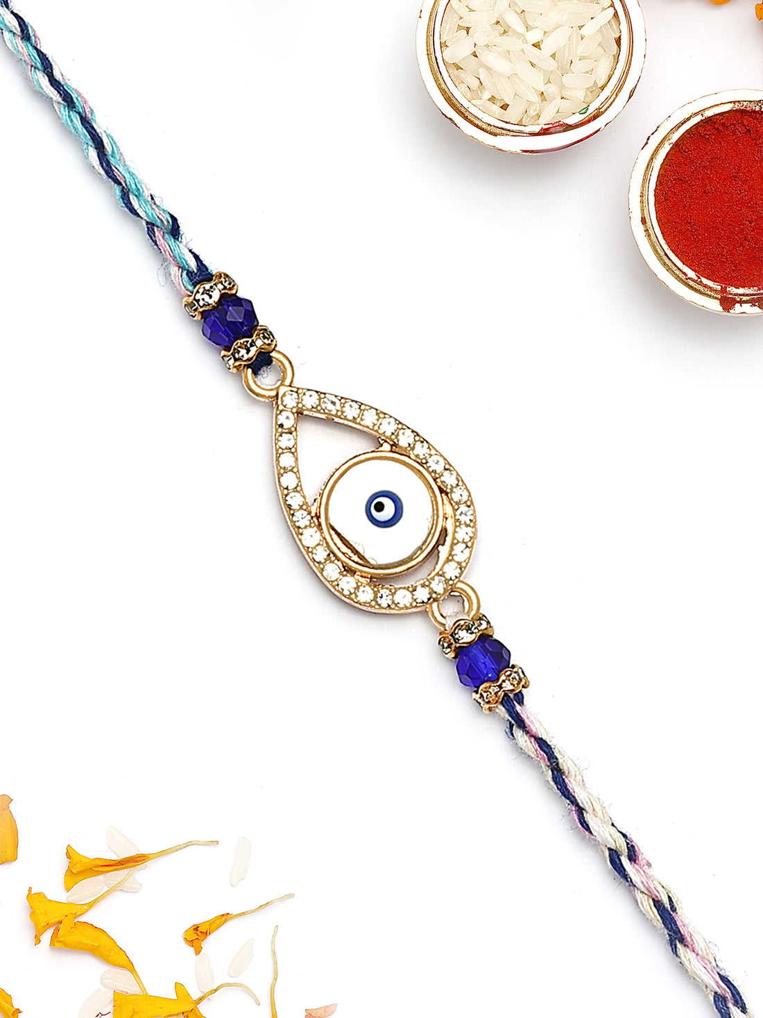 KARATCART Gold Plated White American Diamond Drop Shape Evil Eye Bhaiya Rakhi with Roli & Chawal