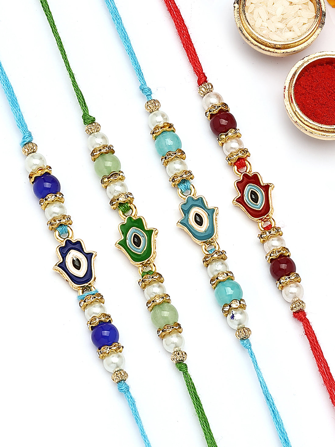 KARATCART Set of 4 Hamsa Hand Evil Eye Design Kundan Rakhi for Brother with Roli & Chawal