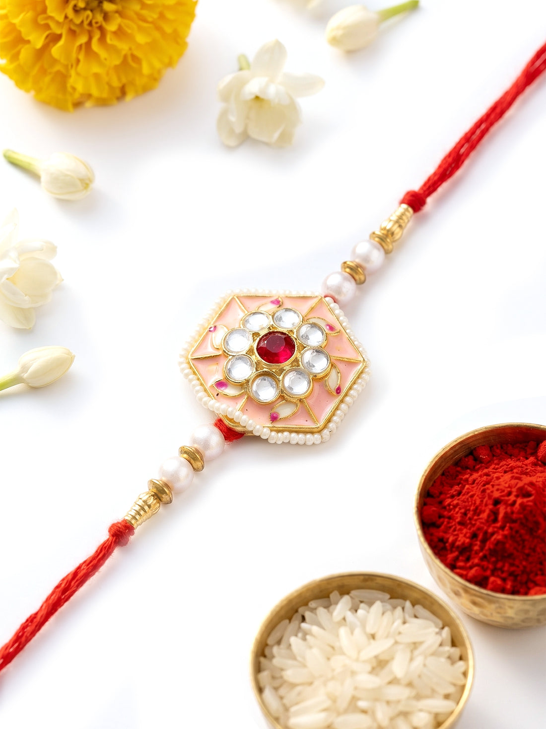 KARATCART Vibrant Pink Meenakari Floral Design Handmade Kundan Rakhi for Brother with Roli Chawal