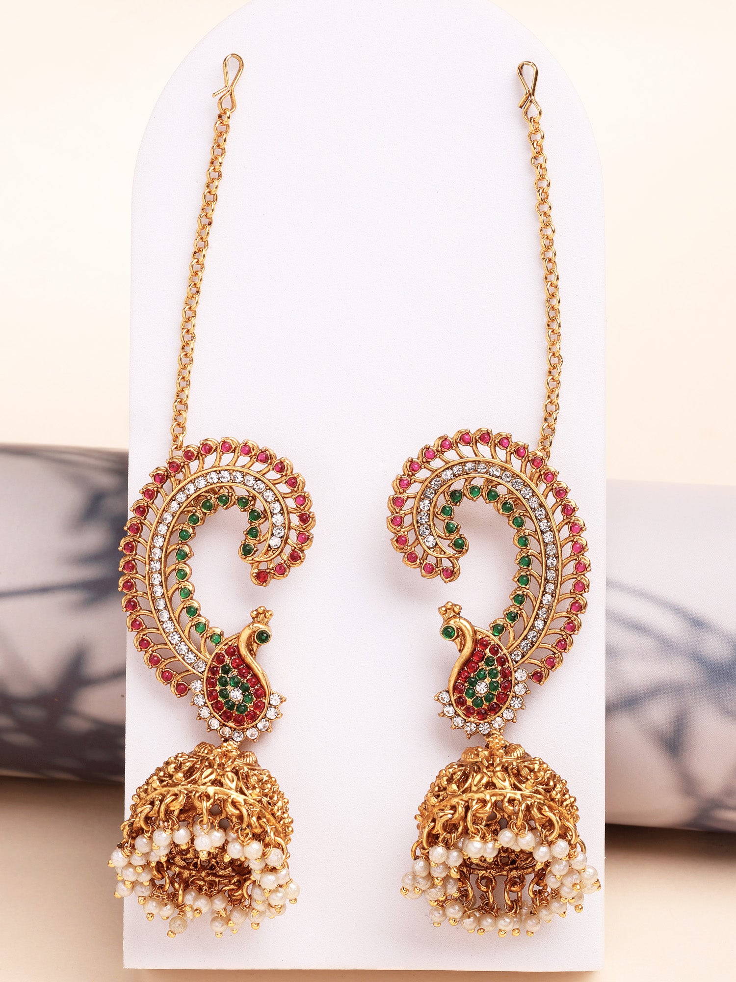 Karatcart Royal Spiral Peacock Gold-Plated Jhumka Earrings with Ear Chains