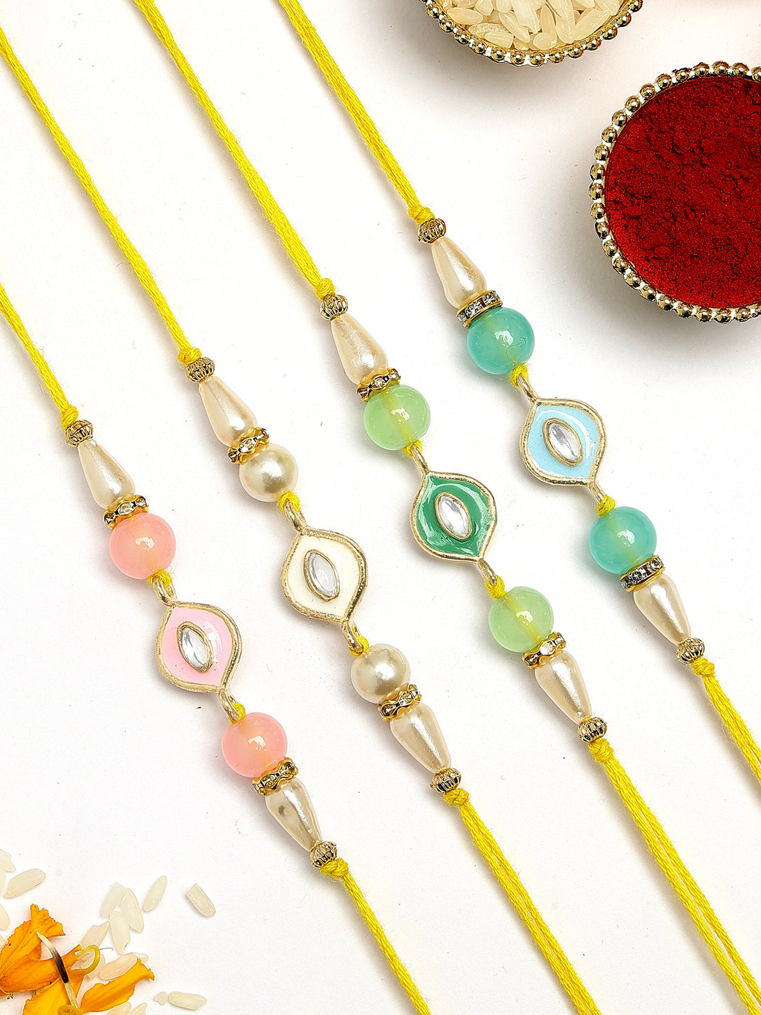 KARATCART Set of 4 Enamel Handmade Evil Eye Kundan Rakhis for Brother with Roli and Chawal