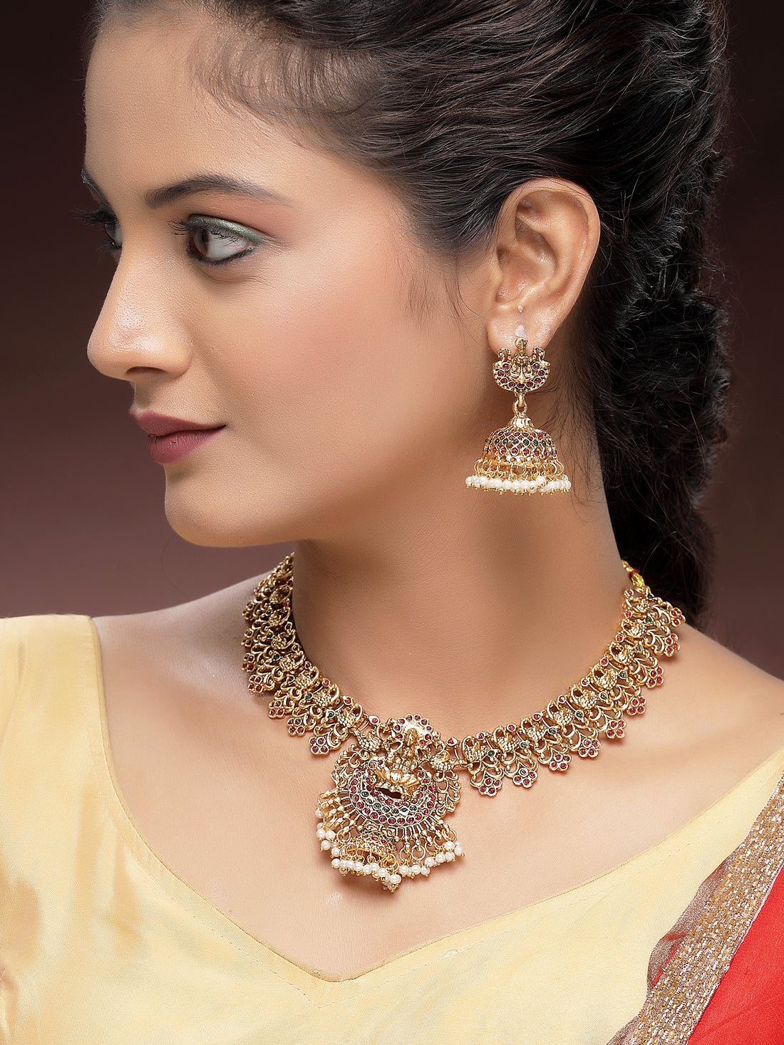 KARATCART Traditional Gold-Plated Laxmi Mata and Peacock Temple Jewellery Set for Women